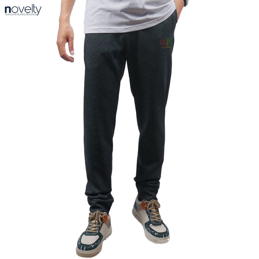 Quần jogger nam Novelty Regular fit họa tiết in phản quang Xám melange NQGMMDMT3R230832Q