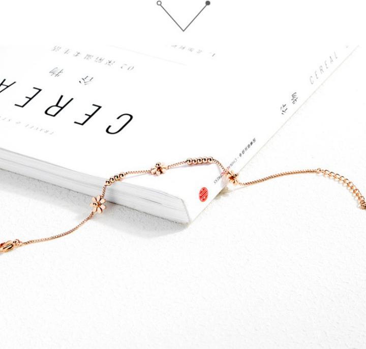 Lắc Tay Hoa Cúc Titan Ko Đen TT 1965