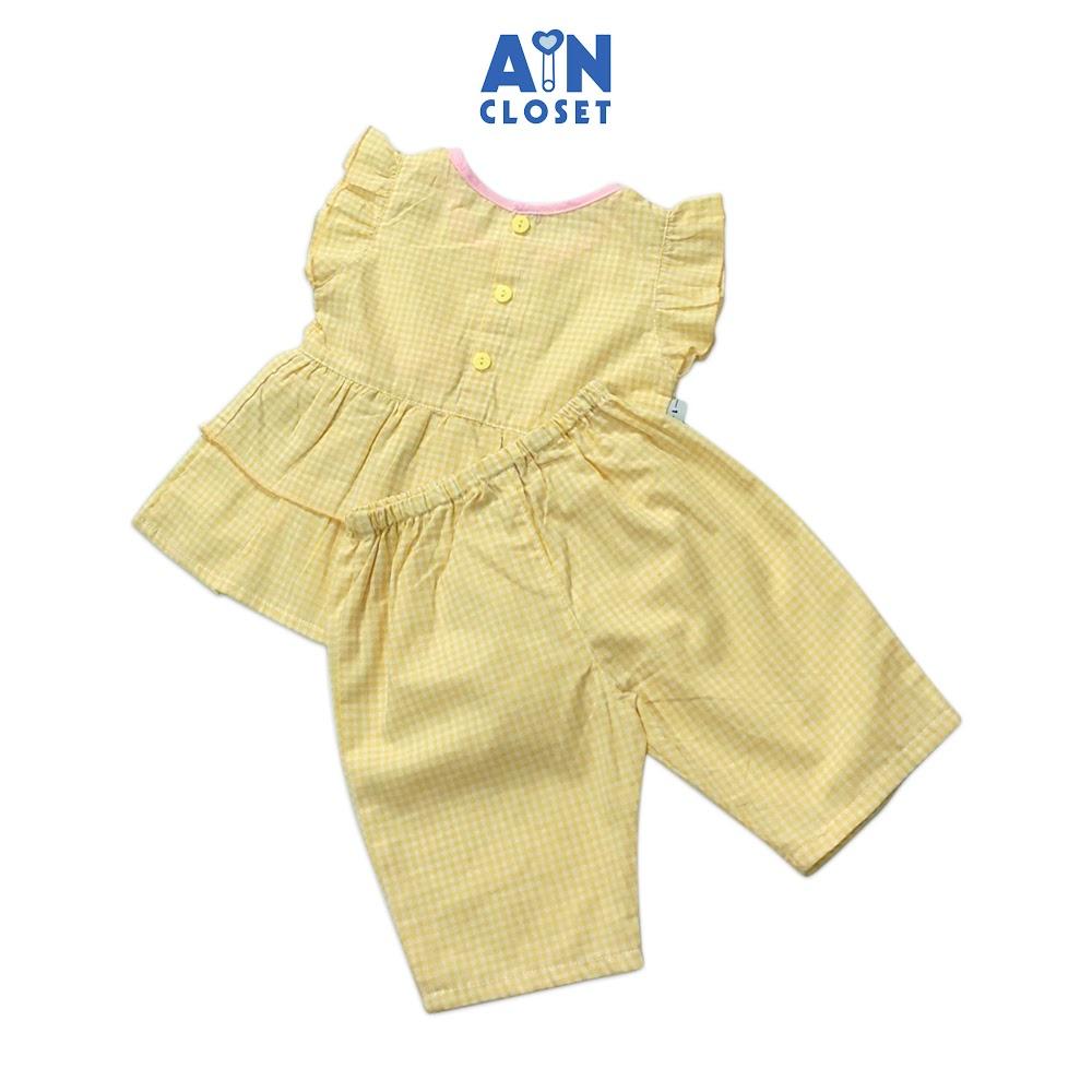 Bộ quần áo lửng bé gái họa tiết Caro vàng nơ cotton - AICDBGSPYSHH - AIN Closet