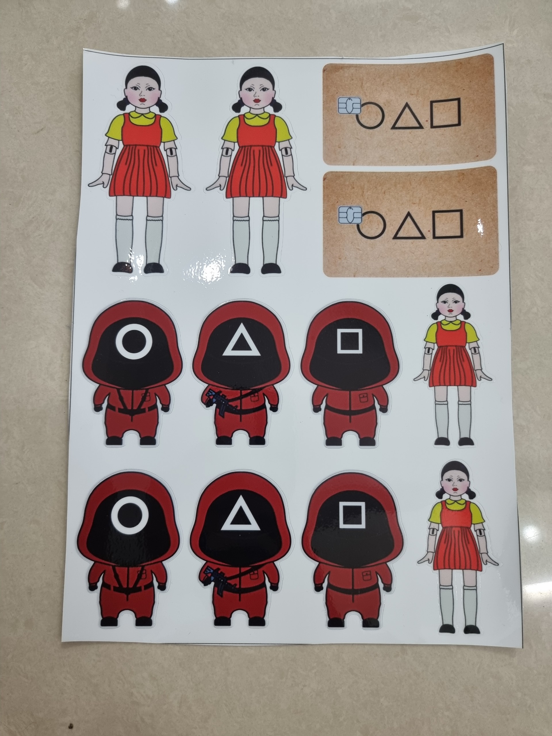 Tem logo sticker trò chơi con mực 1 tấm 18x25cm