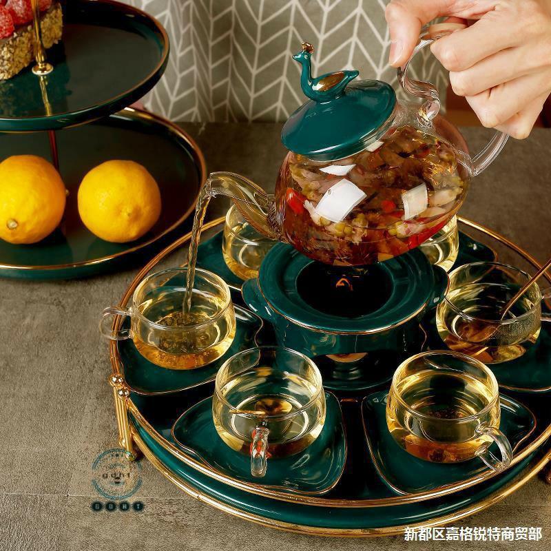Bộ trà thủy tinh bếp nến cao , trắng men sứ xanh cao cấp