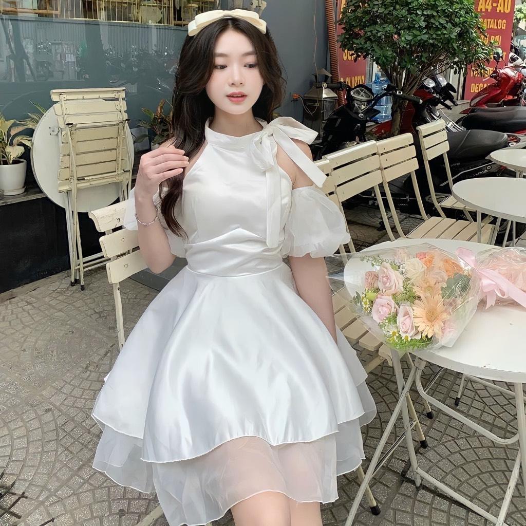 Đầm xòe tầng khoét vai cột nơ tay phồng