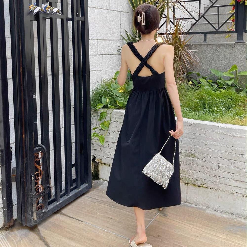 ĐẦM 2 DÂY THUN CHÉO SAU DÁNG XÒE-hình thật shop chụp