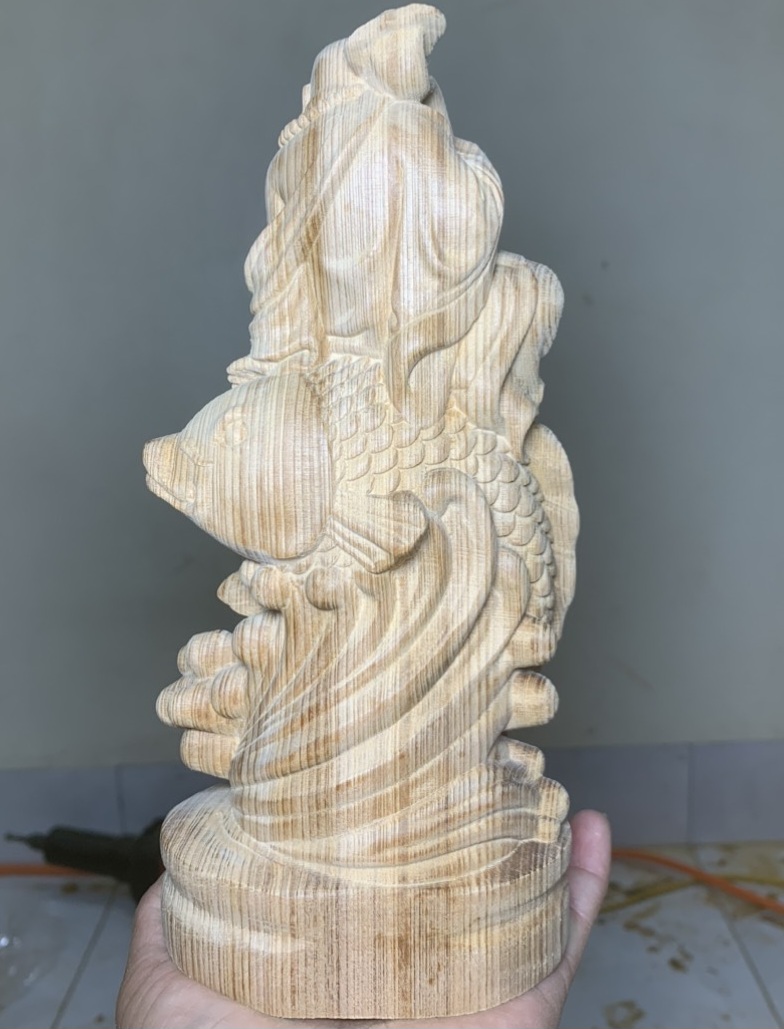 Tượng phật di lặc cưỡi cá chép bằng gỗ ngọc am thơm nức kt cao 20×9×6cm