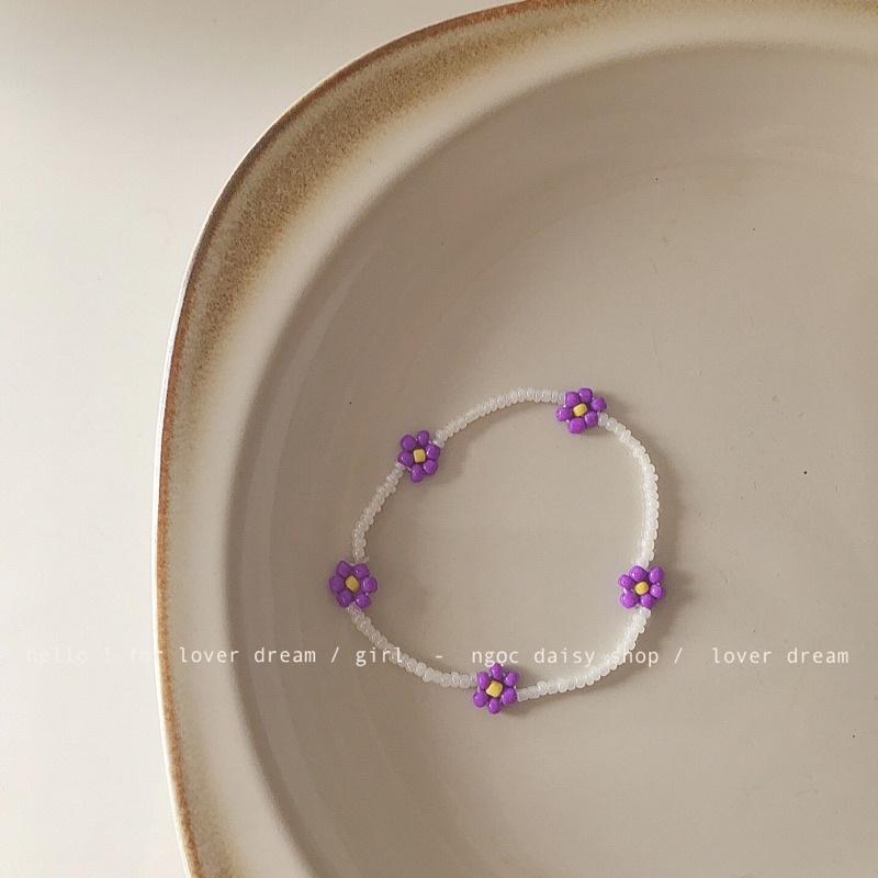 N140 Vòng tay handmade hạt cườm hoa daisy tím dây trắng dễ thương
