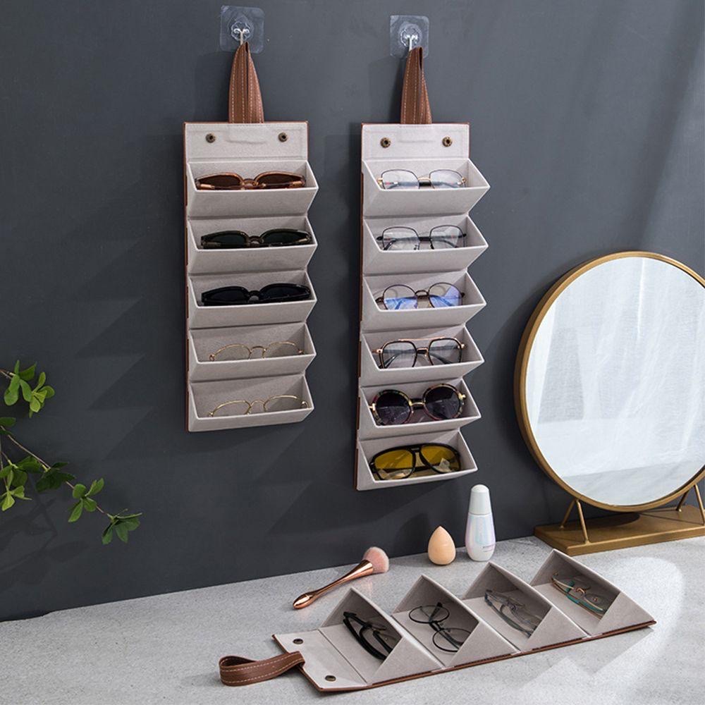 Hộp da PU đựng mắt kính 5 ngăn cuộn tròn , có nút bấm tiện lợi ,có thể treo hoặc xách , mang đi mọi nơi , bảo vệ mắt kính khỏi bụi và hư hỏng