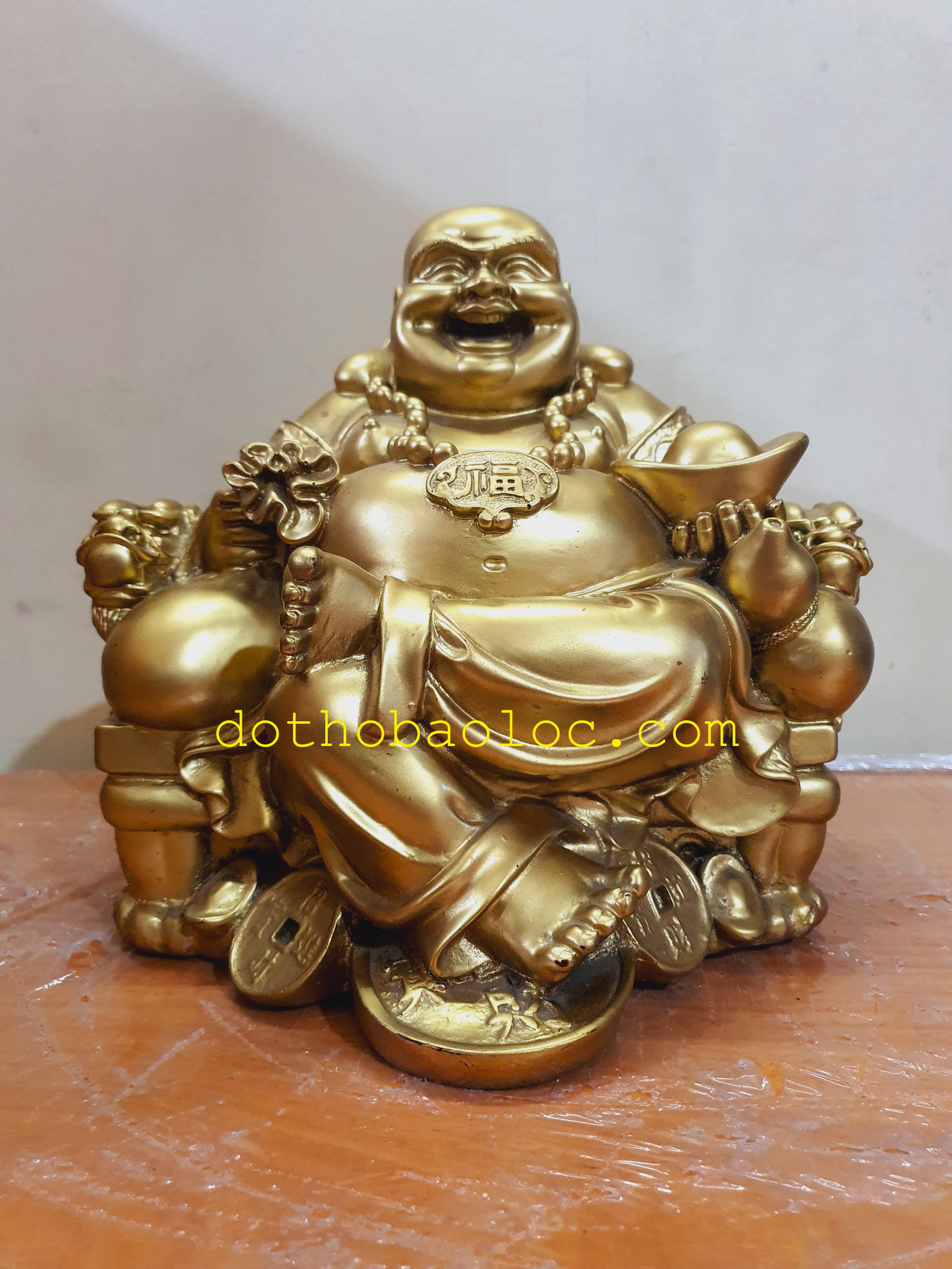 Tượng Di Lặc bột đá cầm thỏi vàng cao 28cm