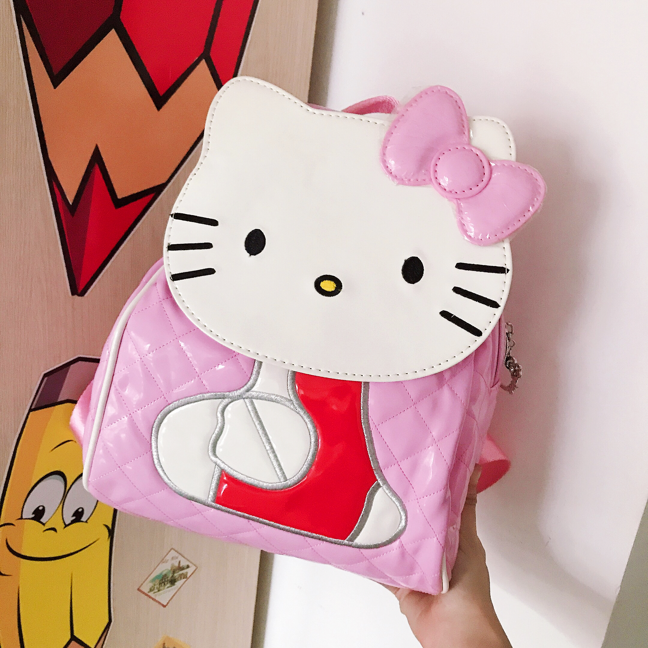 BALO CẶP DA BÓNG 1 NGĂN 10'' HÌNH MÈO HELLO KITTY NƠ MÀU HỒNG NHẠT CHO TRẺ EM BÉ GÁI - 96-HN1139 (21x10x25cm)