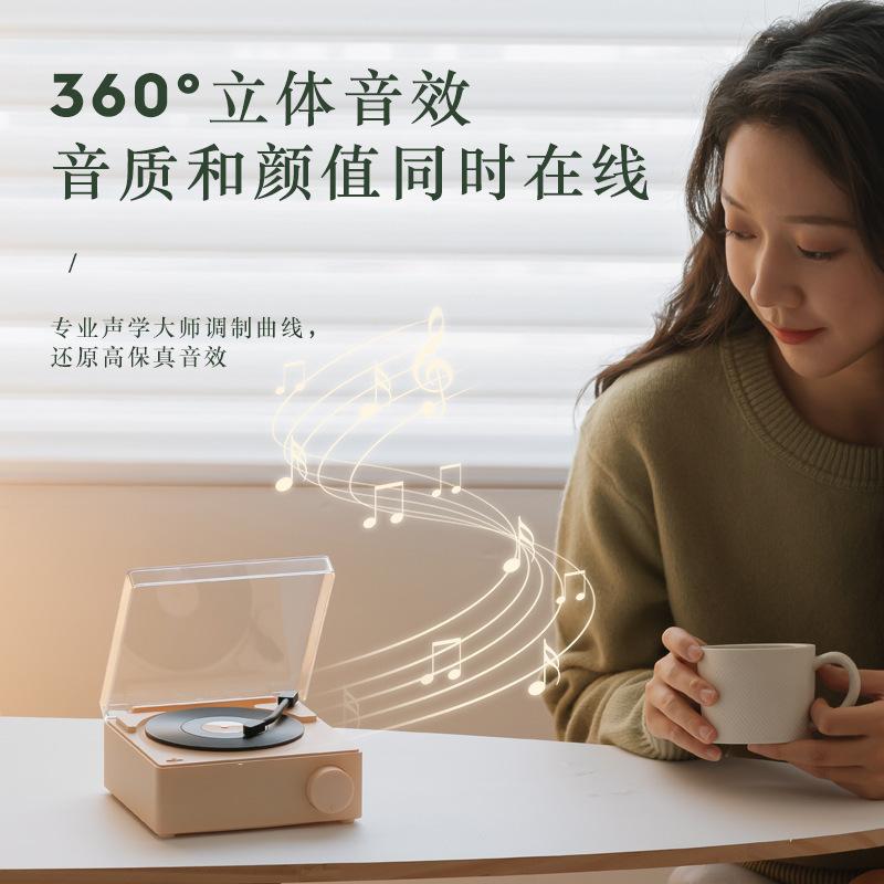 Quảng cáo sáng tạo nguyên tử máy ghi đĩa nhựa âm thanh thẻ cắm âm thanh không dây bluetooth thông minh để bàn đa chức năng loa đồng hồ đồng hồ báo thức