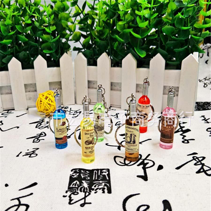 MÓC KHÓA CHAI RƯỢU bán lỗ