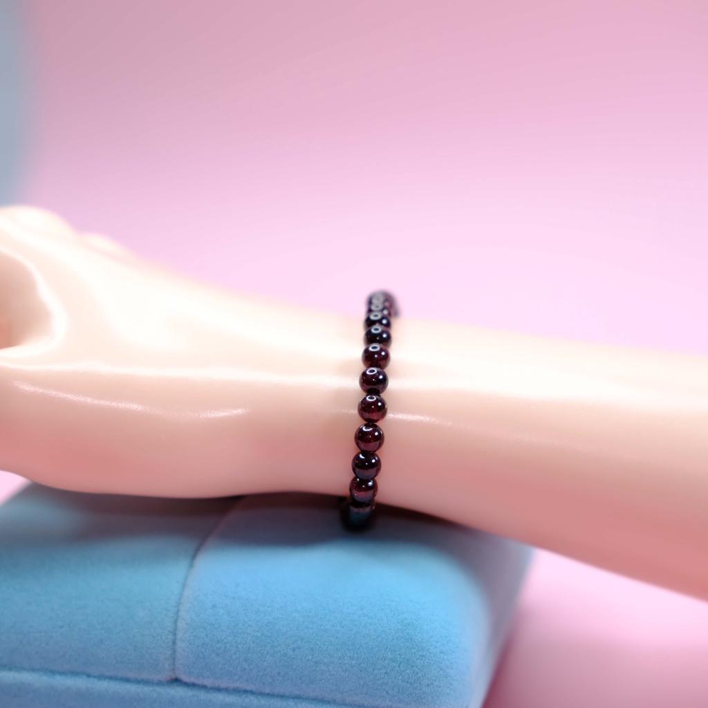 Vòng tay ngọc hồng lựu 6li UPCARA