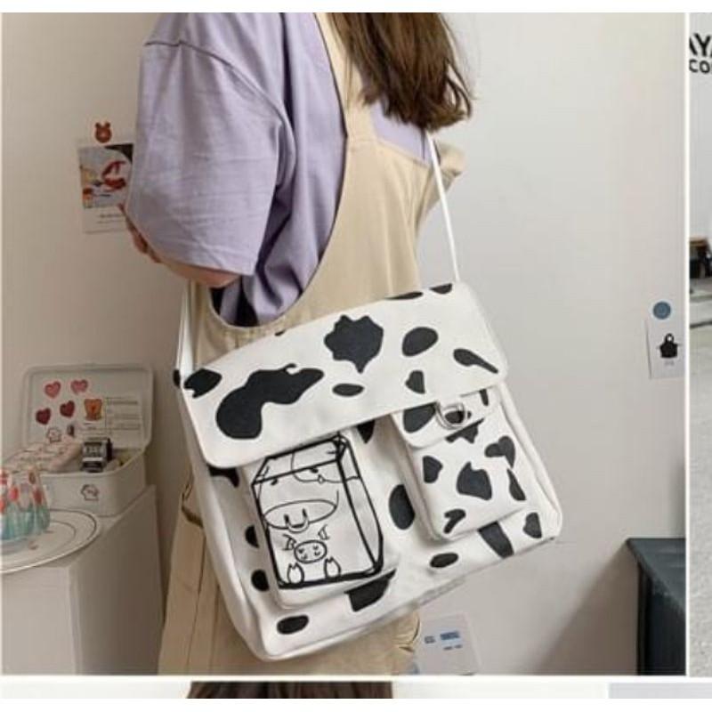 Túi đeo chéo bò sữa + balo