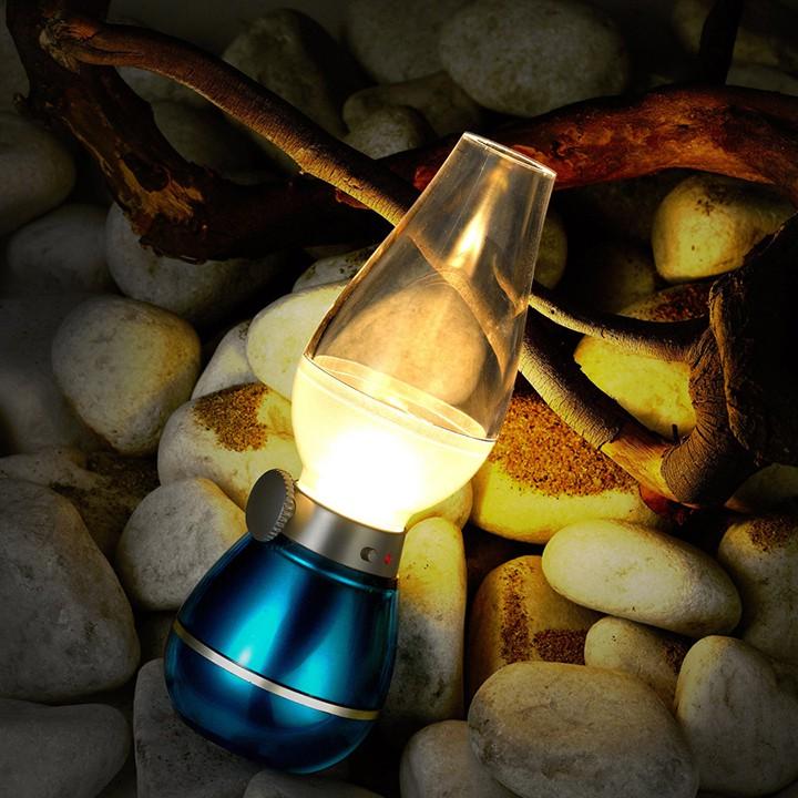 Đèn dầu không khói cảm ứng khi thổi LED màu ngẫu nhiên.