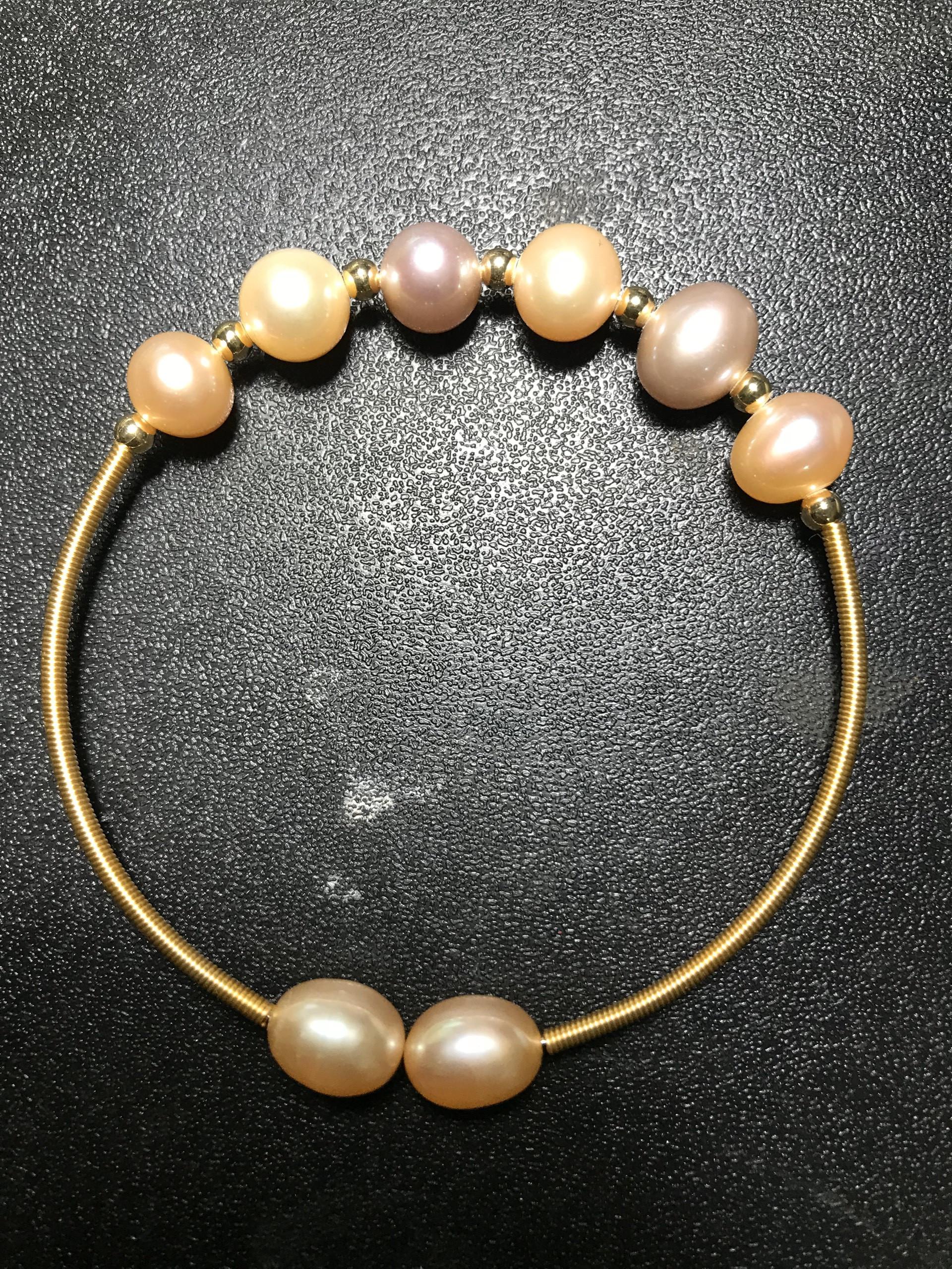Vòng tay ngọc trai handmade đan dây đồng rất xinh