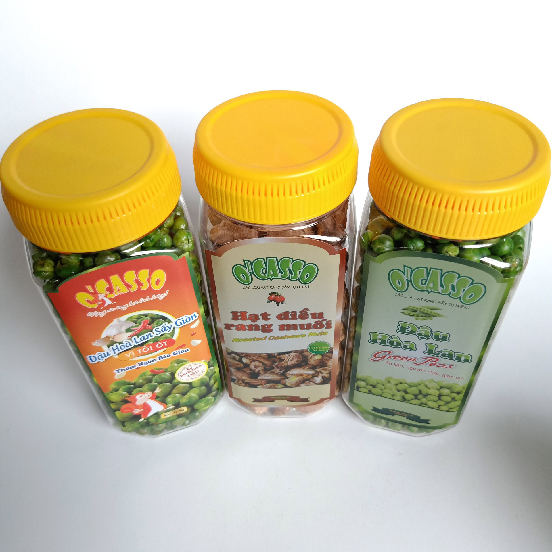 Combo 3 Hộp Hạt Điều Rang Muối Vỏ Lụa 250g + Đậu Hòa Lan Sấy Giòn Vị Tỏi Ớt 275g + Đậu Hòa Lan Sấy Giòn Vị Muối O'Casso 275g
