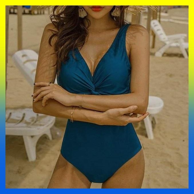 Bikini xanh biển xoắn ngực che bụng cực tốt