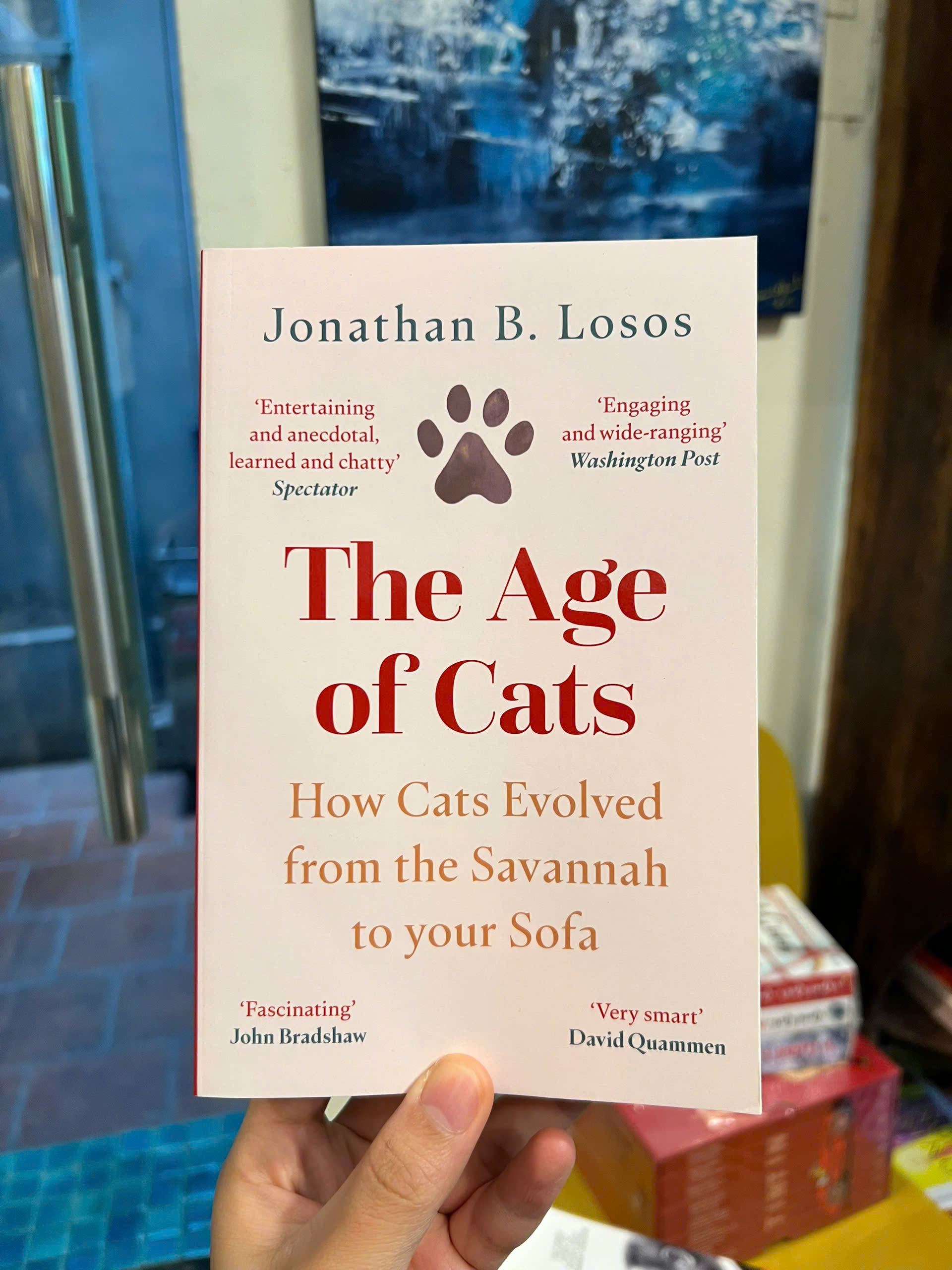 Sách - The Age of Cats: How Cats Evolved From the Savannah to Your Sofa | Nonfiction / Ngoại văn