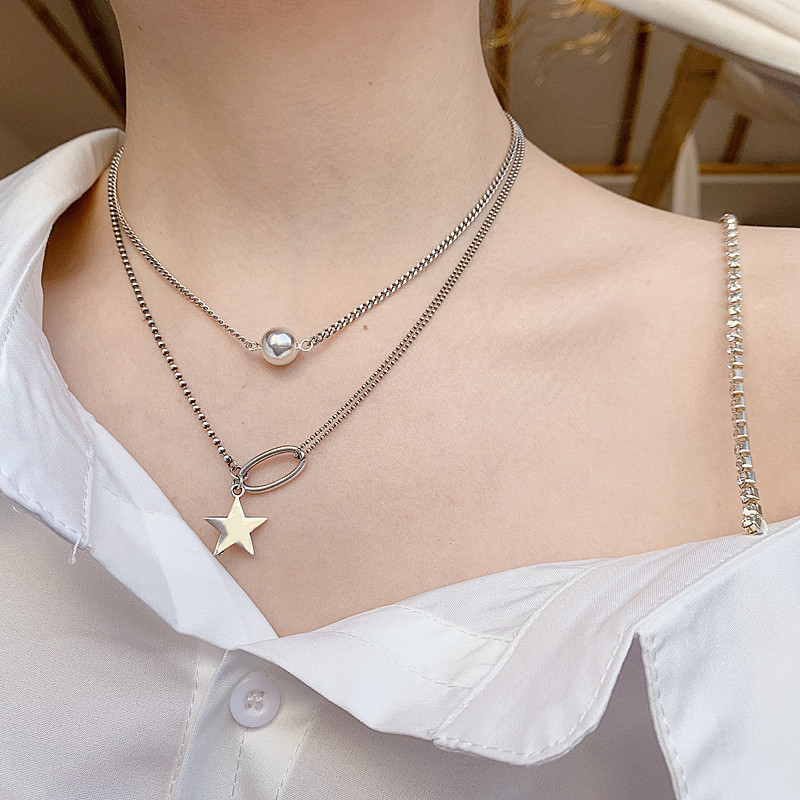 Vòng cổ titan không đen mix sao sành điệu