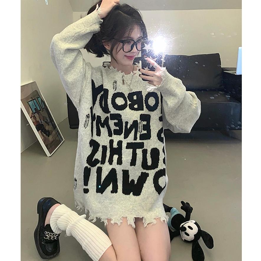 Áo len nữ Montoghi dệt kim DÁNG DÀI IN CHỮ phối RÁCH LAI TUA phom rộng siêu hot