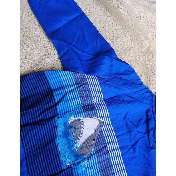 Áo khoác unisex màu xanh dương họa tiết cá mập.
