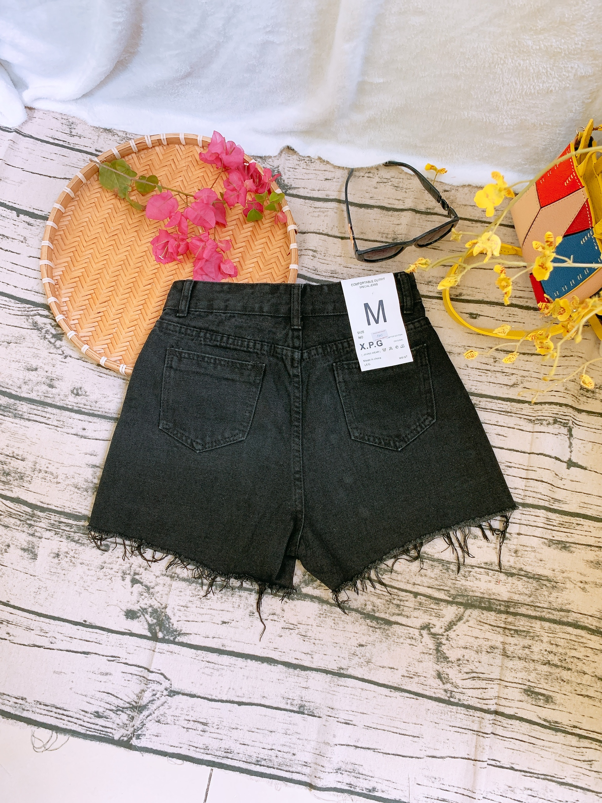 Quần váy jeans ngắn cái nút dọc thân trước
