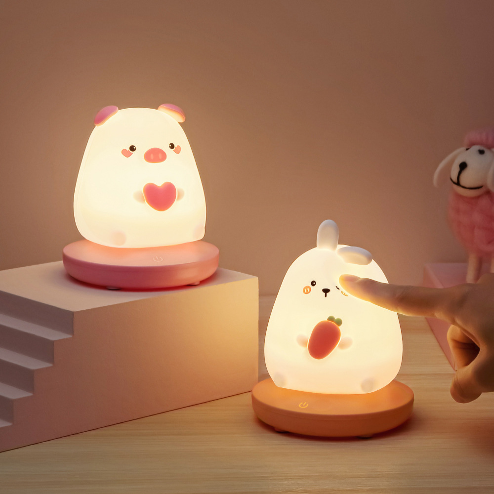 Đèn ngủ silicon thỏ cưng dễ thương đế hồng ánh sáng vàng ấm