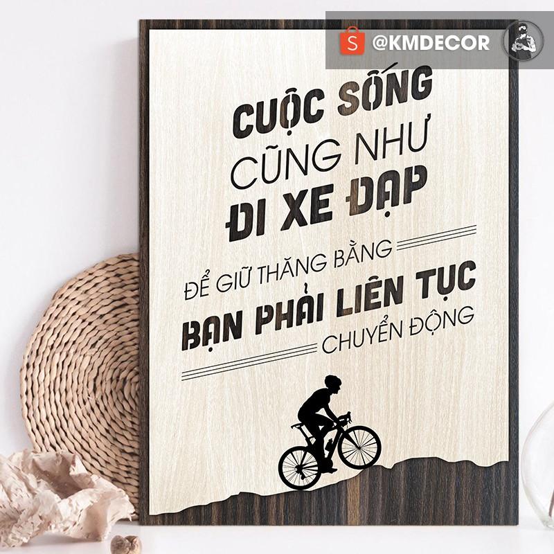 Tran gỗ TBIG - Tạo động lực mẫu câu "cuộc sống cũng như đi xe đạp để giữ thăng bằng bạn phải liên tục chuyển động"