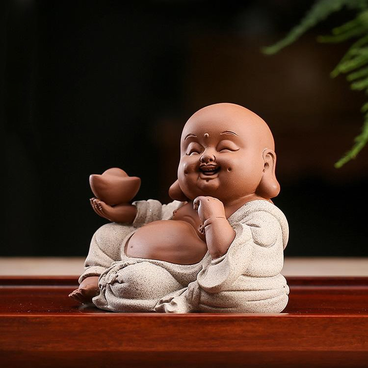 Tượng Phật Di Lạc Cầm Thỏi Vàng