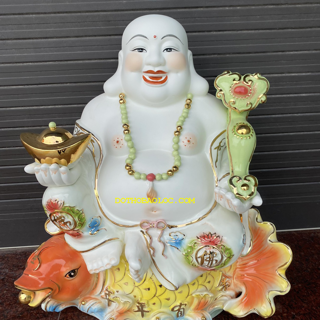 Tượng Di Lặc men sứ ngồi trên cá chép hóa rồng cao 50cm