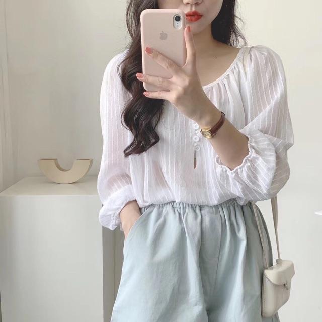 Sơ mi đính nút