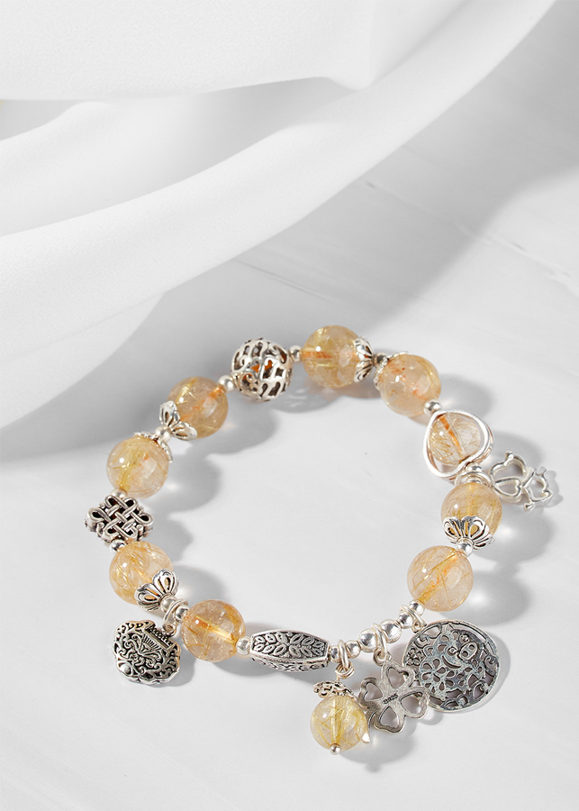 Vòng thạch anh tóc vàng phối charm túi như ý bạc Ngọc Quý Gemstones