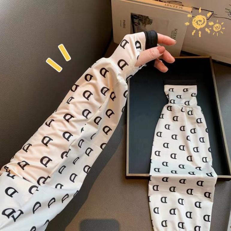 Găng tay chống nắng chống tia UV xỏ ngón dáng rộng vải lụa mát in hoa thời trang - Kanta store
