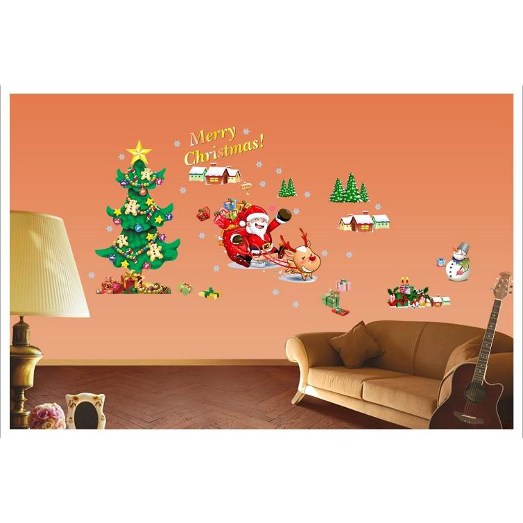 Decal trang trí Noel - Ông Gia Noel ngồi xe Tuần Lộc bay phát quà