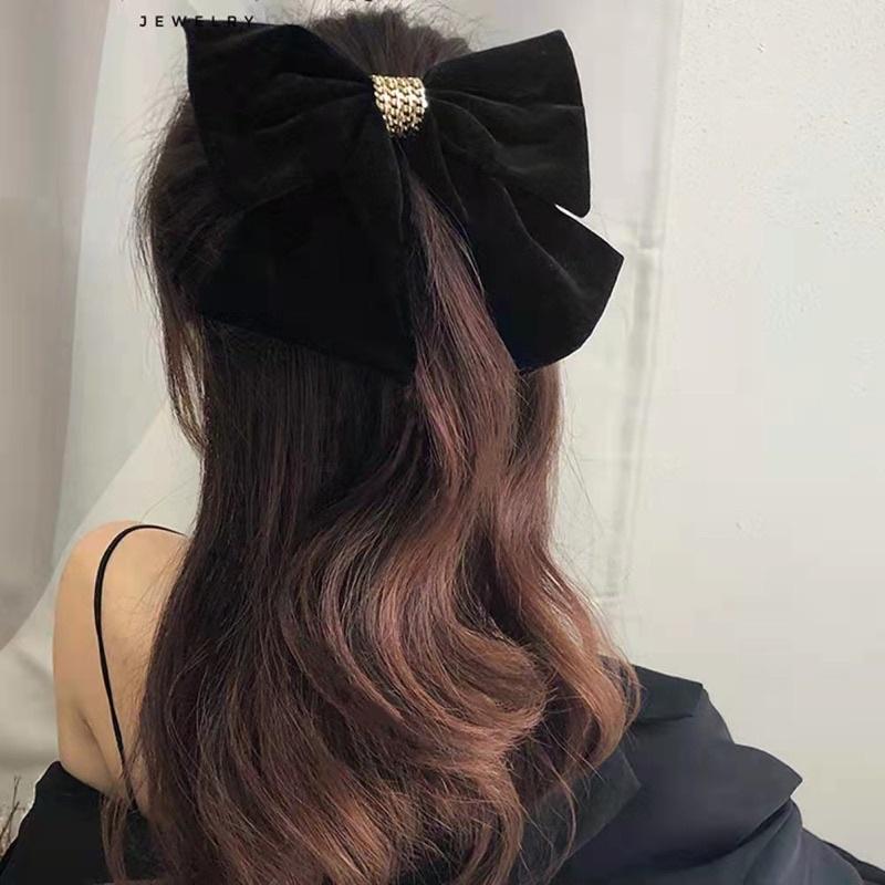 Kẹp tóc nơ nhung phối dây xích cao cấp