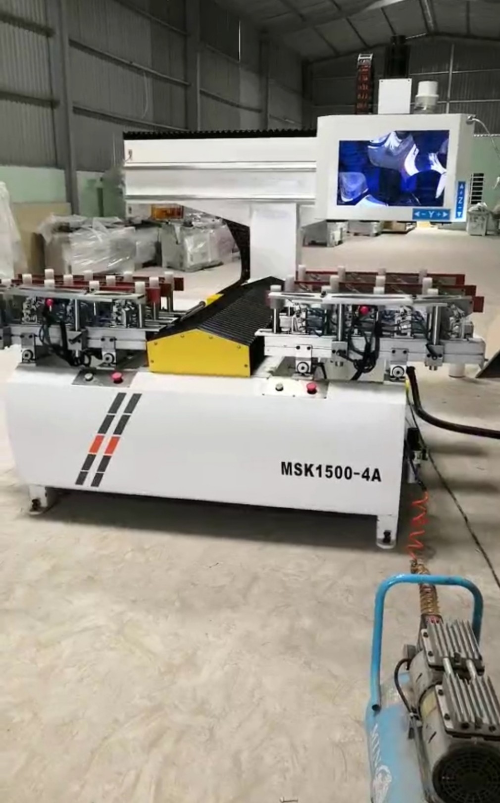 máy CNC mộng âm 4 đầu