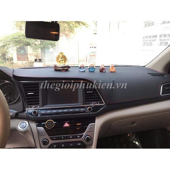 Thảm da Taplo Toyota Fortuner 2009-2015 vân Carbon cao cấp