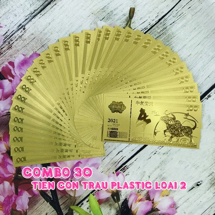 Combo 30 tờ lưu niệm 100 hình con Trâu màu vàng, chất liệu nhựa plastic (loại 1), dùng để trang trí trong nhà