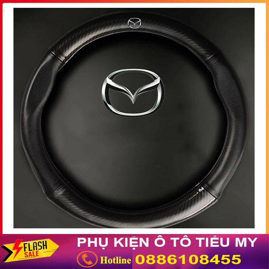 Bọc vô lăng Carbon mẫu cao cấp có đính kèm logo MAZDA màu đen chất liệu da dày dặn thiết kế bắt mắt