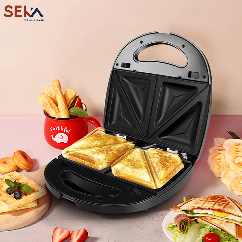 Máy nướng bánh mì tam giác Seka tự động ngắt khi đạt đến nhiệt độ nhất định, giúp chống cháy - Nướng bánh mì, hotdog, xúc xích tay cầm bọc nhựa chống nóng