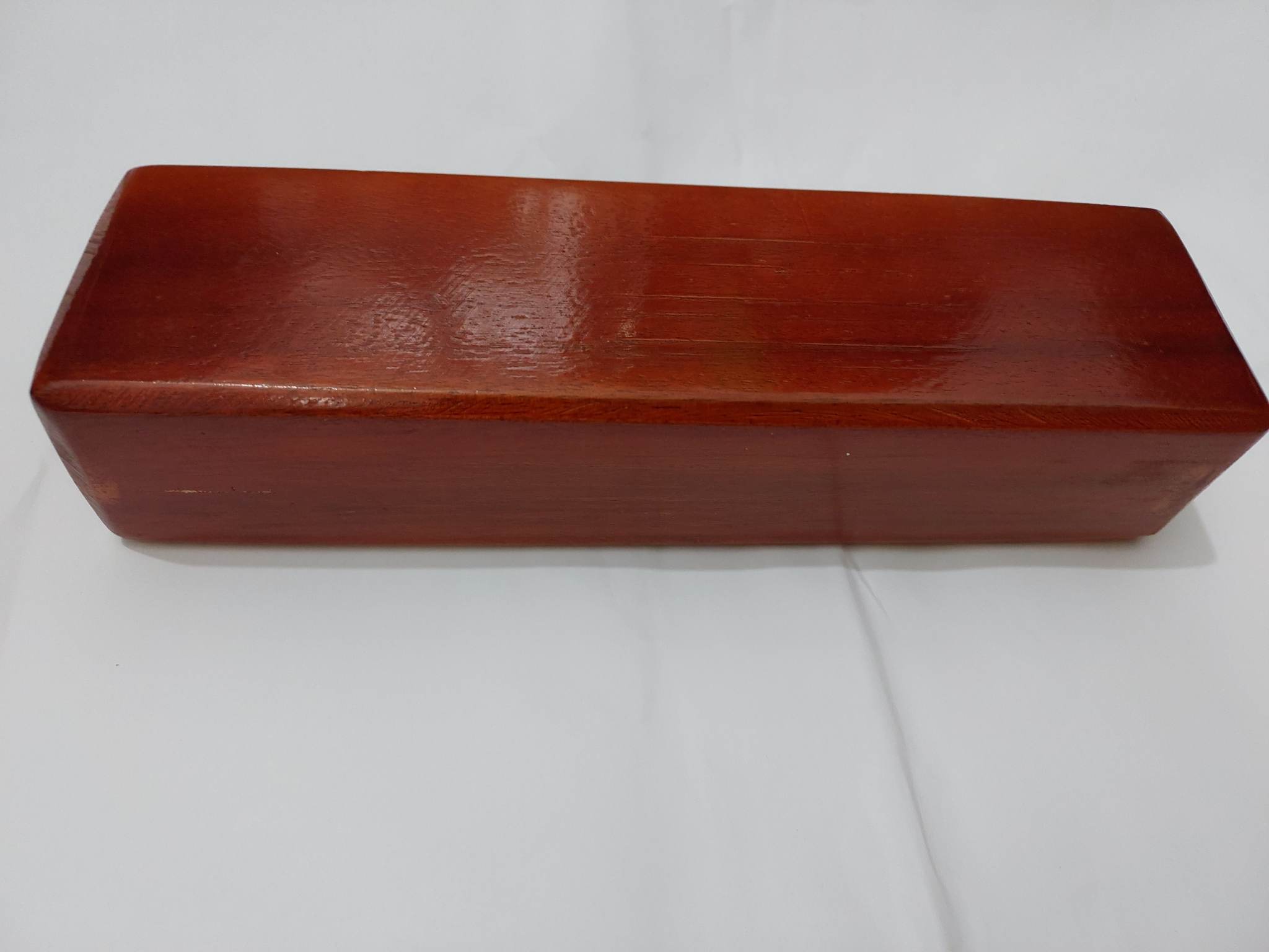 Cục gỗ ủi quần ao