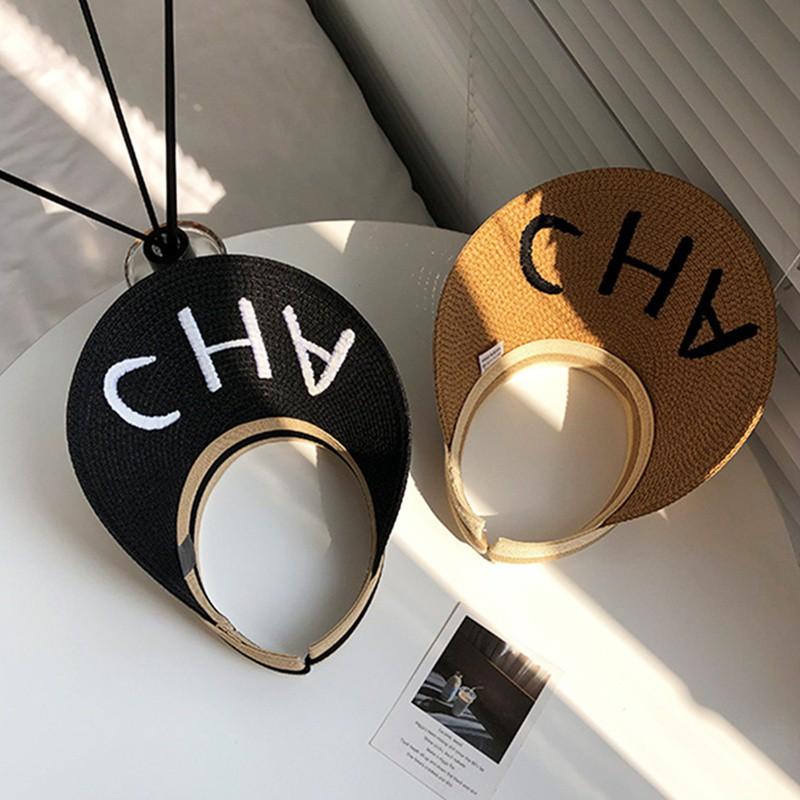 Nón cói rộng vành thêu chữ