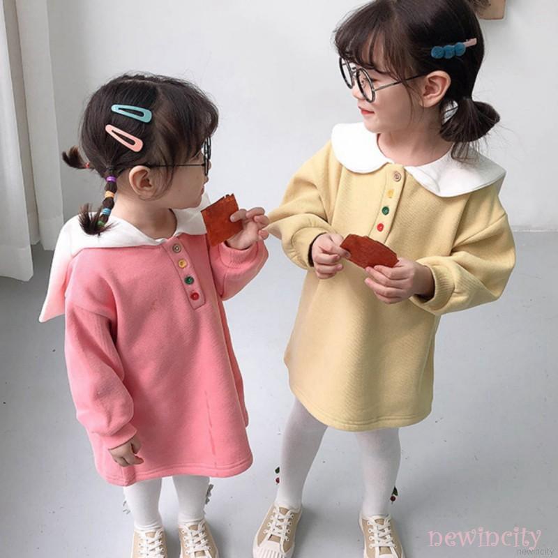 Đầm sweater tay dài vải nhung cổ búp bê dành cho bé