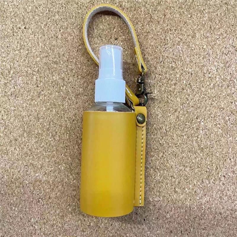 Portable 60ml Spray Bottle with Cover Empty Plastic Refillable Travel Mister Bottle with Leather Keychain Holder