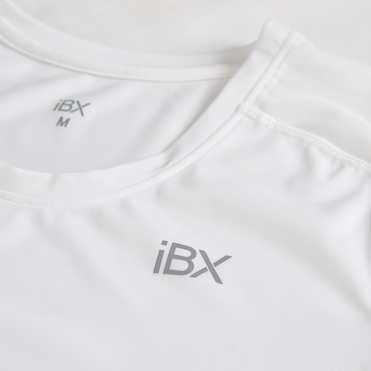 Áo thun nữ thể thao tay ngắn phối viền lưới iBasic IBX130