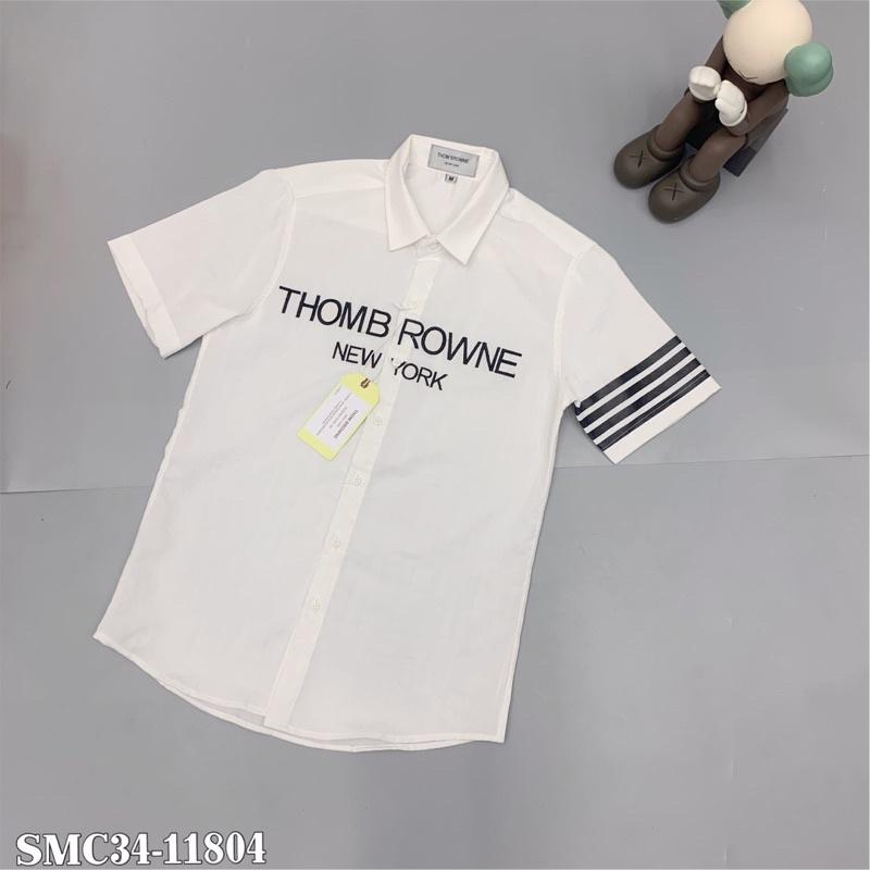 Sơ mi đũi trắng thêu chữ ngực