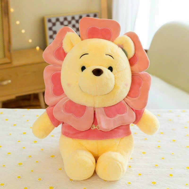 Gấu bông Pooh vàng hoa mặt trời áo nhung hồng thêu logo, hàng Quảng Châu cao cấp