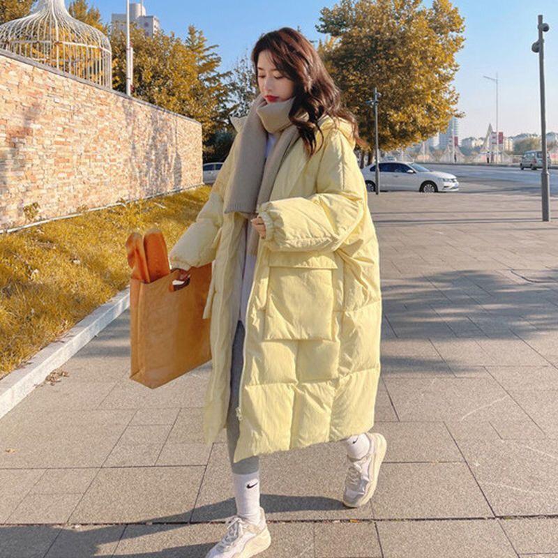 Áo phao nữ màu vàng dáng dài xinh xắn