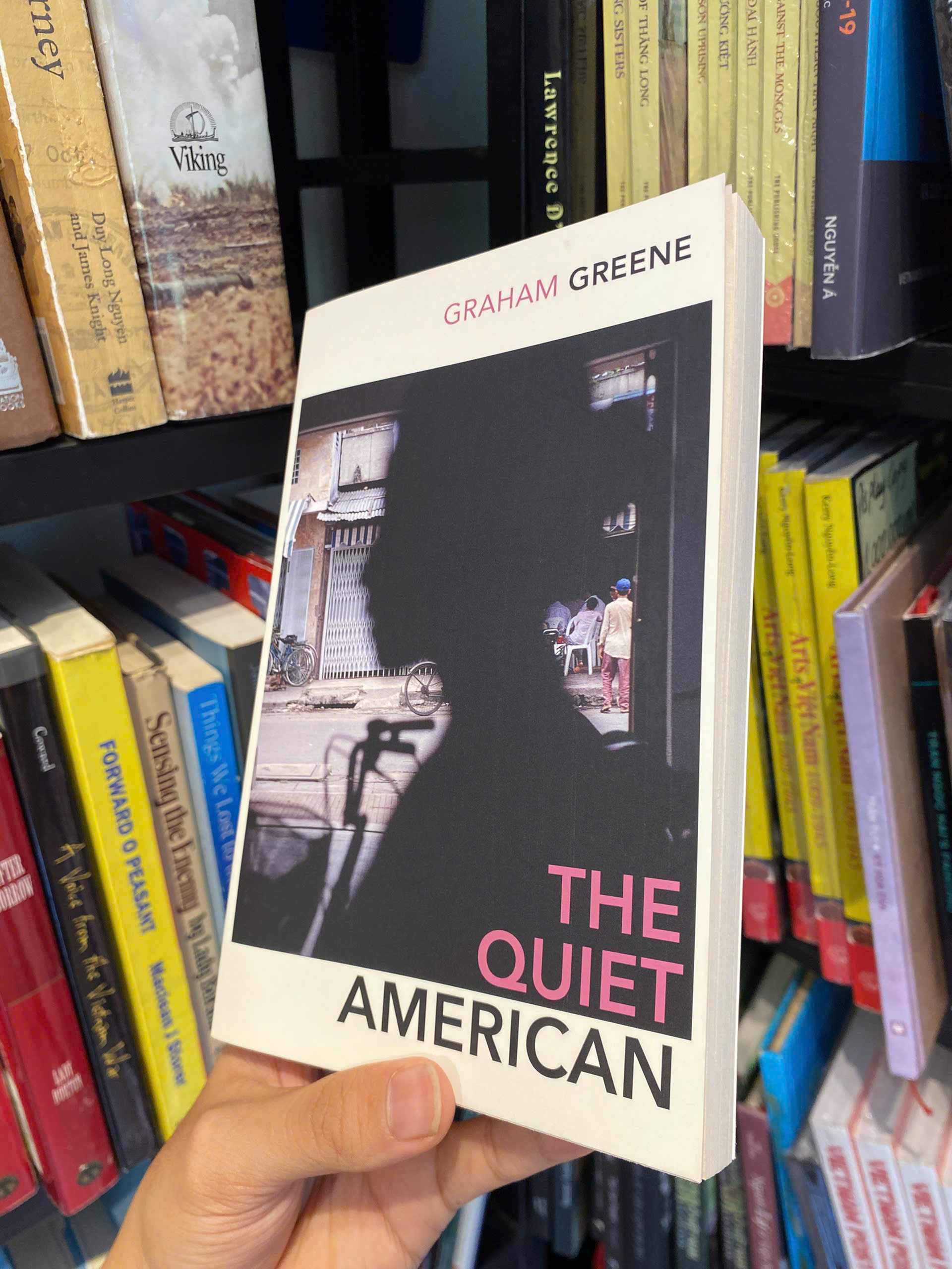 Sách - The Quiet American: Exploration of love, innocence, and morality in Vietnam by Graham Greene | Classics / Historical Fiction / War Literature