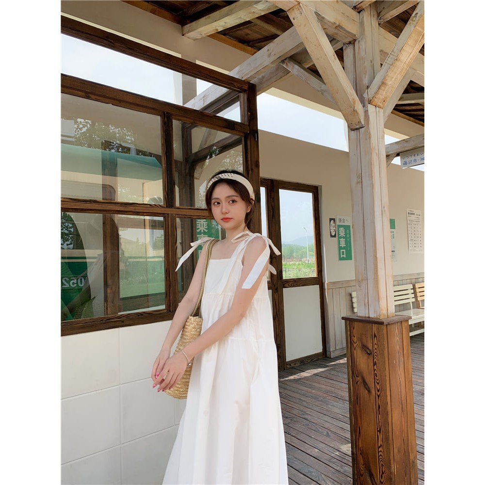 Váy babydoll , đầm xoè hai dây buộc nơ vai dáng dài freesize dạo phố