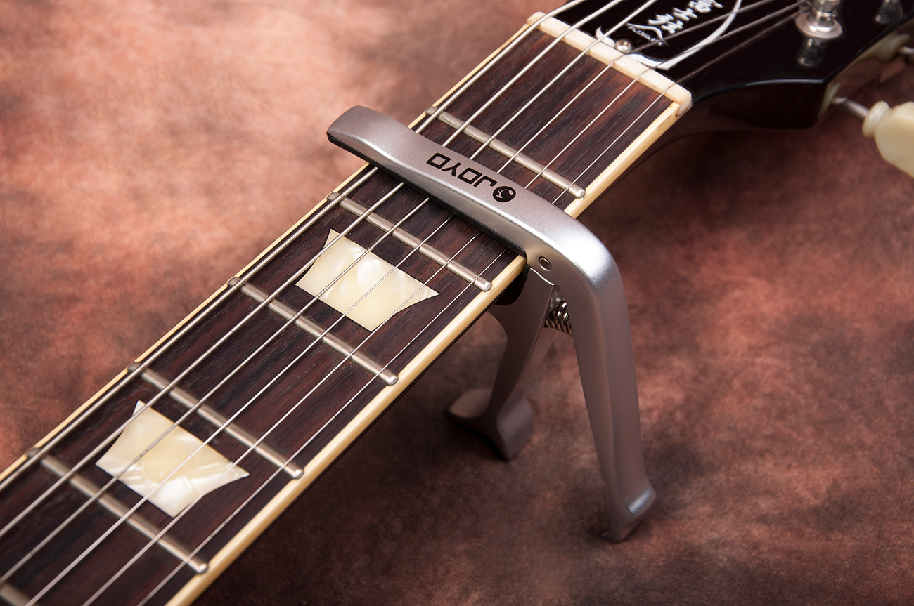 Hình ảnh Capo guitar cao cấp Joyo JCP02 dùng cho đàn guitar acoustic và classic ( Có thêm chức năng nhổ chốt và mở nắp chai ) - Hàng chính hãng